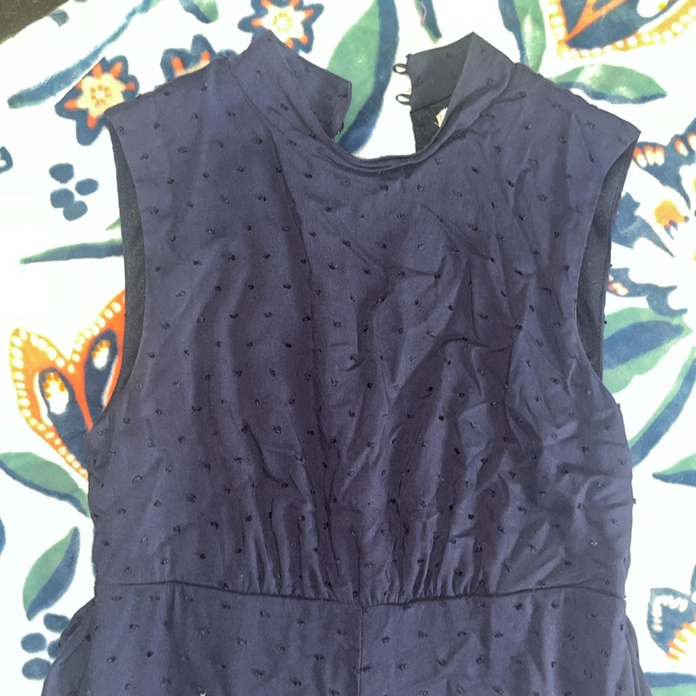 blue jump suit